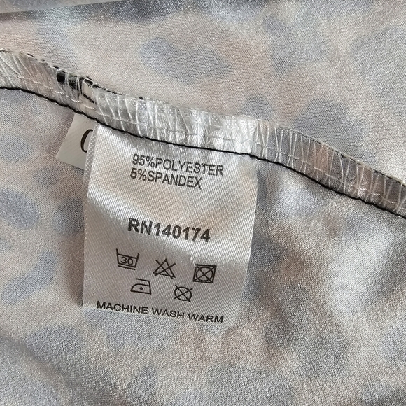 Reborn size Large mid length flowy leapord print, button front dress - Picture 14 of 14